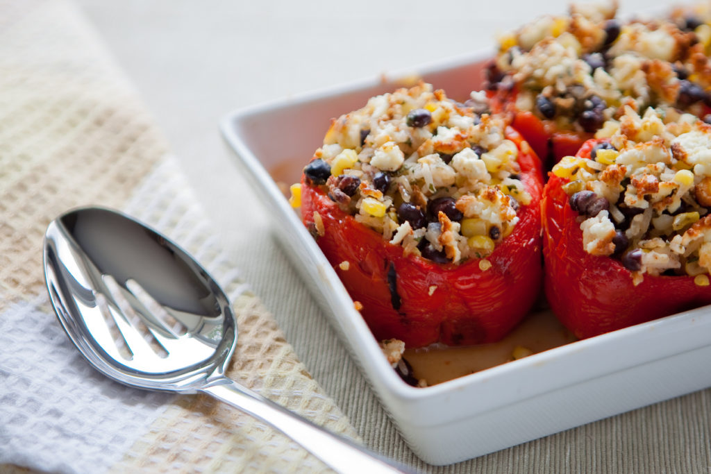 Roasted peppers stuffed with corn, rice and black beans