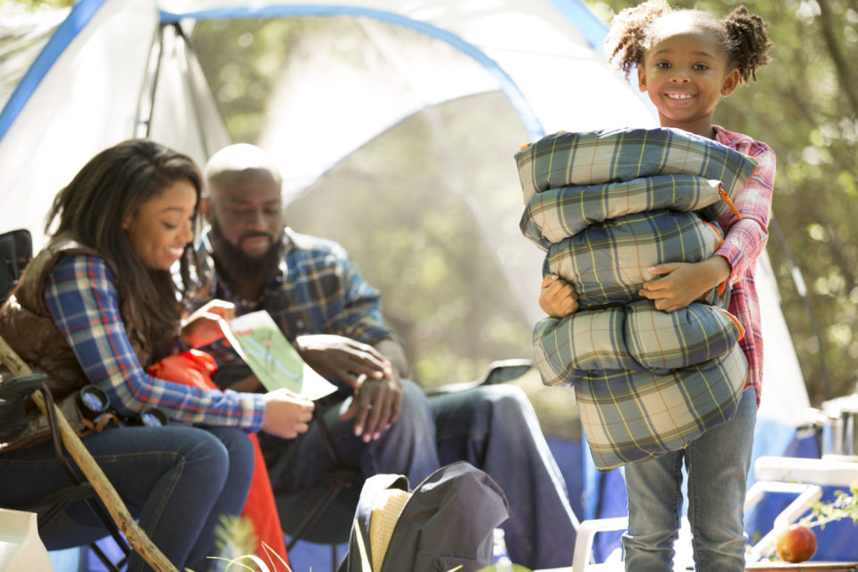 Family enjoying a camping trip.