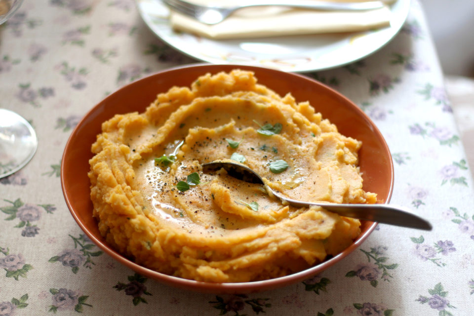 Mashed sweet potatoes in bowl.