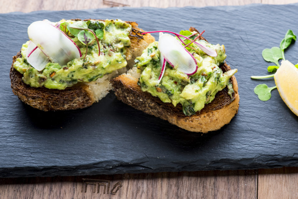 Avocado toast on serving board