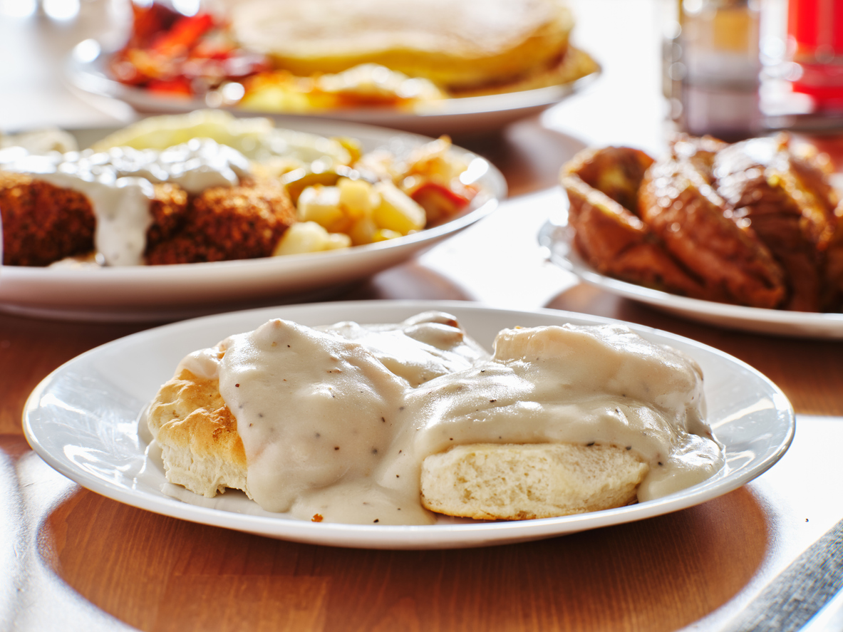 biscuits and gravy with breakfast foods 