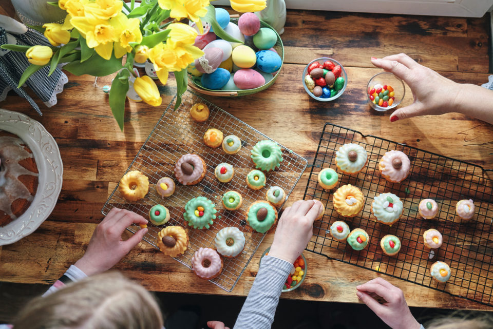 Preparing Small Easter Bunt Cakes with Icing