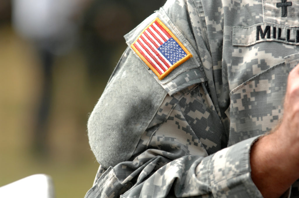 American flag attached to the American military uniform.