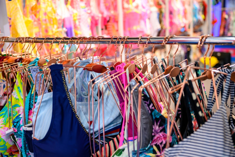 Swimsuits on hanger at boutique