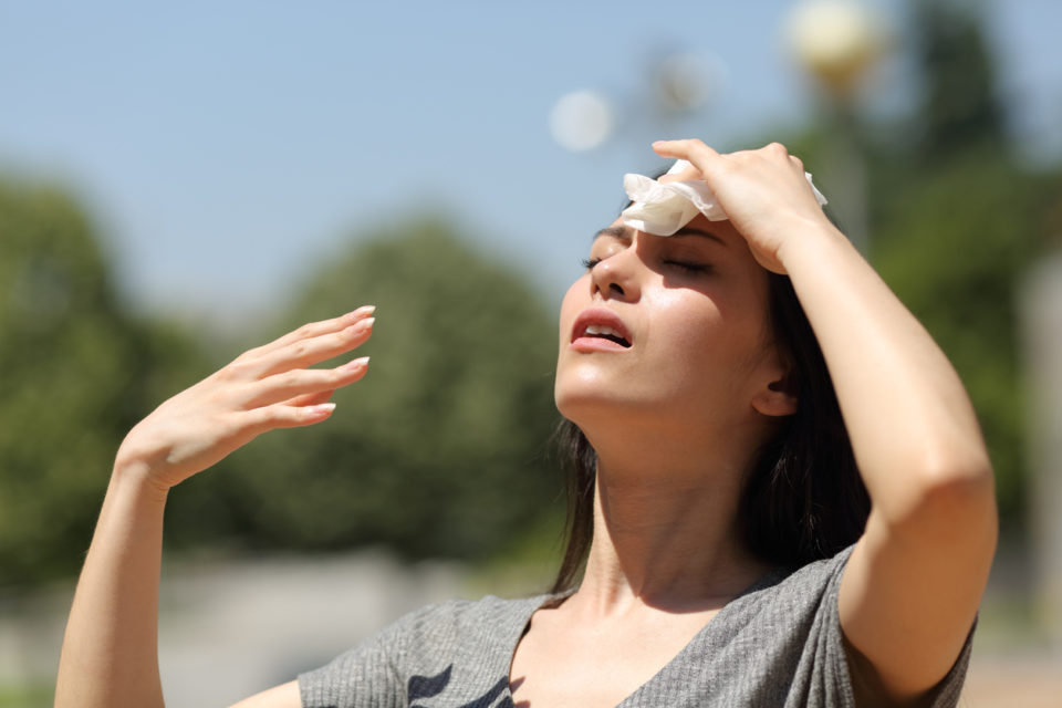 woman sweating in the heat